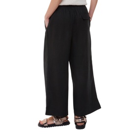 Model wearing Whistles Linen Relaxed Fit Trousers in black, wide-leg style with elasticated waistband, styled with brown strappy sandals