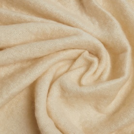 Foxford Off-White Mohair Throw in cream, close-up showing soft draped texture of 75% mohair and 25% wool fabric