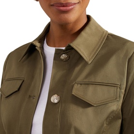 Model wearing Hobbs Farrah Button-Down Jacket in green, showing classic collar, silver buttons and military-inspired flap pockets
