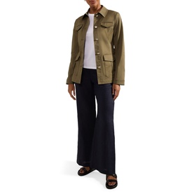 Model wearing Hobbs Farrah Button-Down Jacket in green with classic collar, flap pockets, styled with navy wide-leg trousers and brown sandals