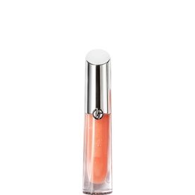 Armani Beauty Prisma Glass Lip Gloss in a sheer coral-peach shade, clear tube with silver cap