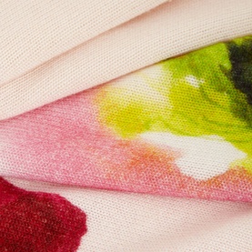 Phase Eight Erika Placement Floral Sweater in multi, close-up showing large pink, red and green floral print on cream knit fabric