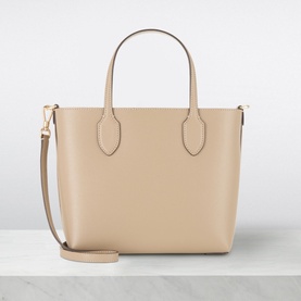 Kate Spade Bleecker Medium Leather Crossbody Bag in taupe, smooth leather, dual top handles, detachable strap, gold-tone hardware