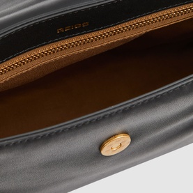 Reiss Selena Logo Crossbody Bag in black leather, open interior view showing tan cotton lining and gold-tone snap button fastening