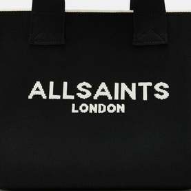 All Saints Izzy Knitted Mini Tote Bag in black with white jacquard logo, top handles visible, knitted construction detail