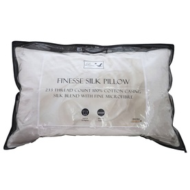The Soft Bedding Co Silk Microfibre Pillow in white, packaged in clear plastic wrap with product label visible