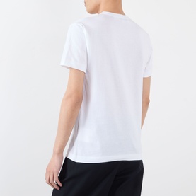 Model wearing Comme Des Gar&ccedil;ons Play Double-Heart Logo T-Shirt in blue, rear view showing crew neck, short sleeves and straight hem.