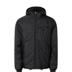 Prada Triangle Logo Puffer Jacket in black with detachable hood, front zip fastening, and enamel triangle logo chest detail