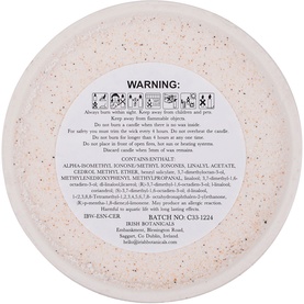 Irish Botanicals Elderberry & Spotted Nettle Candle, pale pink soy wax, double wick, warning and ingredients label visible on base