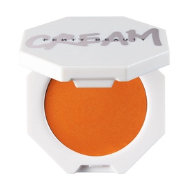 Fenty Cheeks Out Freestyle Cream Blush in Fuego Flush, 3g, in white octagonal compact with vibrant orange-red cream formula