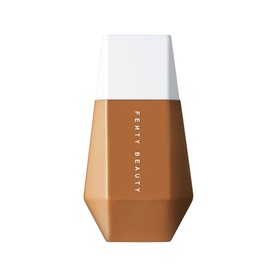 Fenty Beauty Eaze Drop Blurring Skin Tint foundation in a warm tan shade, geometric bottle with white cap, 32ml