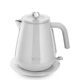 Delonghi Eclettica Kettle in white with chrome lid finial, sculpted base, and ergonomic handle on matching power base