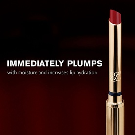 Est&eacute;e Lauder Pure Colour Explicit Slick Shine Lipstick in deep red, gold-toned bullet casing, with plumping and hydration claim text