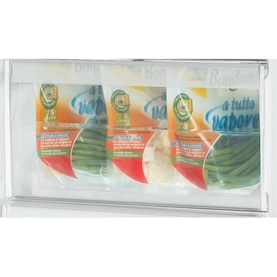 Indesit Freestanding 60cm NoFrost Freezer 223L interior drawer showing organised frozen vegetable storage bags