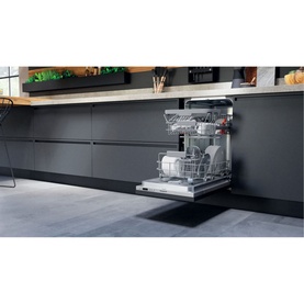 Hotpoint Built-In Slimline Dishwasher 9 Place 54cm, open with loaded racks, integrated into dark grey fitted kitchen cabinetry