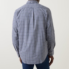 Model wearing Gant Embroidered Logo Gingham Shirt in navy, rear view showing box pleat and gingham pattern, styled with dark jeans