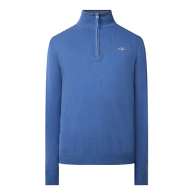 Gant Shield Half-Zip Logo Sweater in blue, featuring funnel neckline, half-zip fastening, ribbed trims, and small chest logo