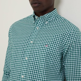 Model wearing Gant Gingham Single-Cuff Casual Shirt in green, featuring button-down collar and chest logo embroidery
