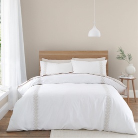 Bianca Embroidery Leaf Duvet Set in Natural, white cotton bedding with delicate leaf embroidery border, styled on a double bed