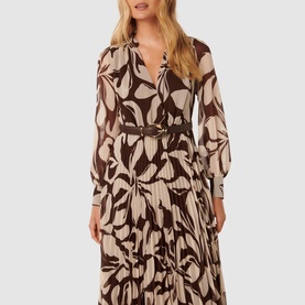 Model wearing Forever New Saskia Printed Pleated Dress in brown floral print, featuring wrap bodice, pleated midi skirt, and belted waist