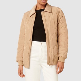 Model wearing Forever New Jacinta Quilted Jacket in brown, featuring classic collar and front zip, styled with white trousers and black top