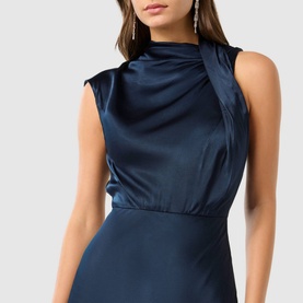 Model wearing Forever New Sienna Satin Flared Dress in blue, featuring draped cowl neckline, cap sleeve, and lustrous satin finish