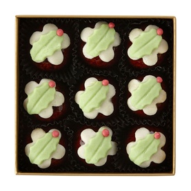 Fortnum & Mason Marzipan Christmas Puddings 100g, box of nine flower-shaped marzipan sweets with green and white icing and pink dot detail