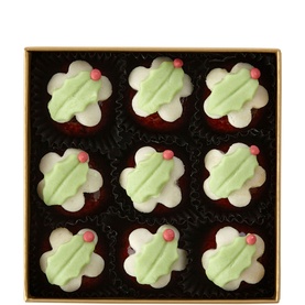 Fortnum & Mason Marzipan Christmas Puddings 100g, box of nine flower-shaped marzipan sweets with green and white icing and pink dot detail