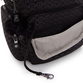 Kipling City Zip S Backpack in black printed polyamide, close-up of zip pocket with grey lining, silver-tone hardware and monkey charm detail
