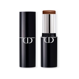 Dior Forever Skin Perfect Foundation Stick in deep brown shade, black cylindrical stick packaging with silver CD logo, cap removed