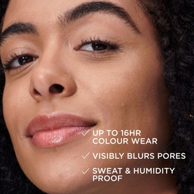 Model wearing IT COSMETICS Your Skin But Better CC+ Natural Matte SPF 40 in Medium, close-up showing blurred pores and natural finish skin