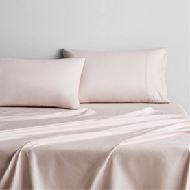 Sheridan 500 Thread Count Fitted Sheet in Light Pink cotton sateen, styled on a bed with two matching pillowcases