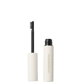Victoria Beckham Beauty FeatherFix Brow Gel in Blonde, cream tube with spoolie brush applicator shown open beside cap