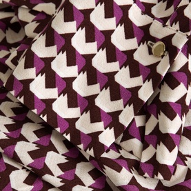 Phase Eight Gina Printed Shirt in purple and cream geometric houndstooth print, showing fabric detail with visible button at cuff