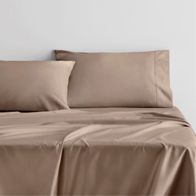 Sheridan 1000 Thread Count European Pillowcase in Mocha light brown cotton sateen, styled on a neatly made bed with matching sheet set
