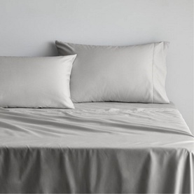 Sheridan 1000 Thread Count Fitted Sheet Dove in light grey cotton sateen, styled on a bed with matching pillowcases