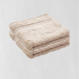 Sheridan Luxury Egyptian Towel in Natural, folded stack of two, soft textured 100% Egyptian cotton in warm beige tone