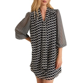 Model wearing Phase Eight Suki Printed Pussybow Mini Dress in blue, with three-quarter semi-sheer blouson sleeves and V-neckline with bow tie detail