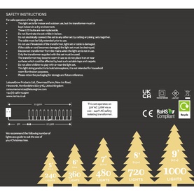 Noma 240 Warm White LED String Lights packaging showing safety instructions, light count guide, and Christmas tree graphics