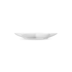 Le Creuset Stoneware Star Plate 20cm in white, shown from the side highlighting its gently curved star-shaped silhouette