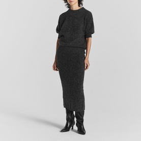 Model wearing Twist & Tango Remi Knit Sweater in grey, short puff sleeves, round neck, styled with matching knit midi skirt and black knee-high boots
