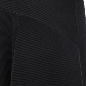 All Saints Gia Asymmetric Flared Skirt in black, close-up showing ribbed texture, panelled detail and flared silhouette