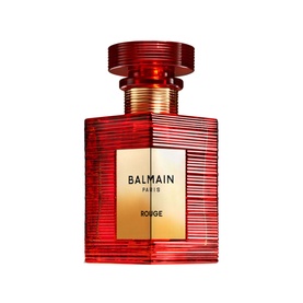 Balmain Rouge Eau de Parfum in a red textured glass bottle with gold label, spray cap