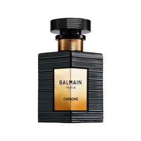 Balmain Carbone Eau de Parfum in a black ribbed bottle with gold label and cap, unisex EDP fragrance