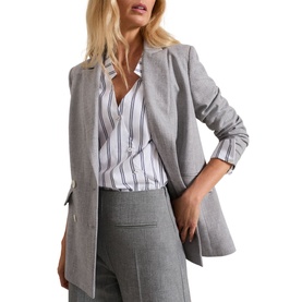 Model wearing Phase 8 Ashlyn Asymmetric Striped Blouse in white with V-neckline, styled with grey blazer and wide-leg trousers