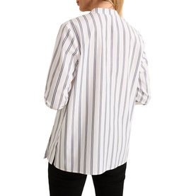 Model wearing Phase Eight Ashlyn Asymmetric Striped Blouse in white cotton, back view, with black vertical stripes and long sleeves