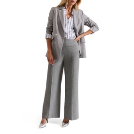 Model wearing Phase Eight Ashlyn Asymmetric Striped Blouse in white, styled with grey wide-leg trousers, double-breasted blazer and silver heels