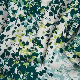 Hobbs Beatrix Floral Blouse in white viscose with green and teal floral print, shown as fabric detail close-up