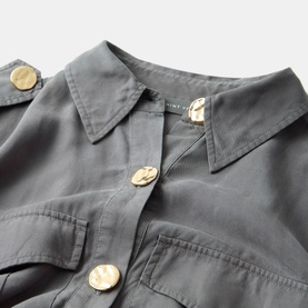 Mint Velvet Utility Shirt Dress in grey, close-up of classic collar, shoulder epaulettes and gold-tone button fastening