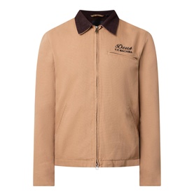 Deus Ex Machina Address Barn Jacket in tan cotton canvas with dark corduroy collar, two-way zip fastening and logo detail to chest
